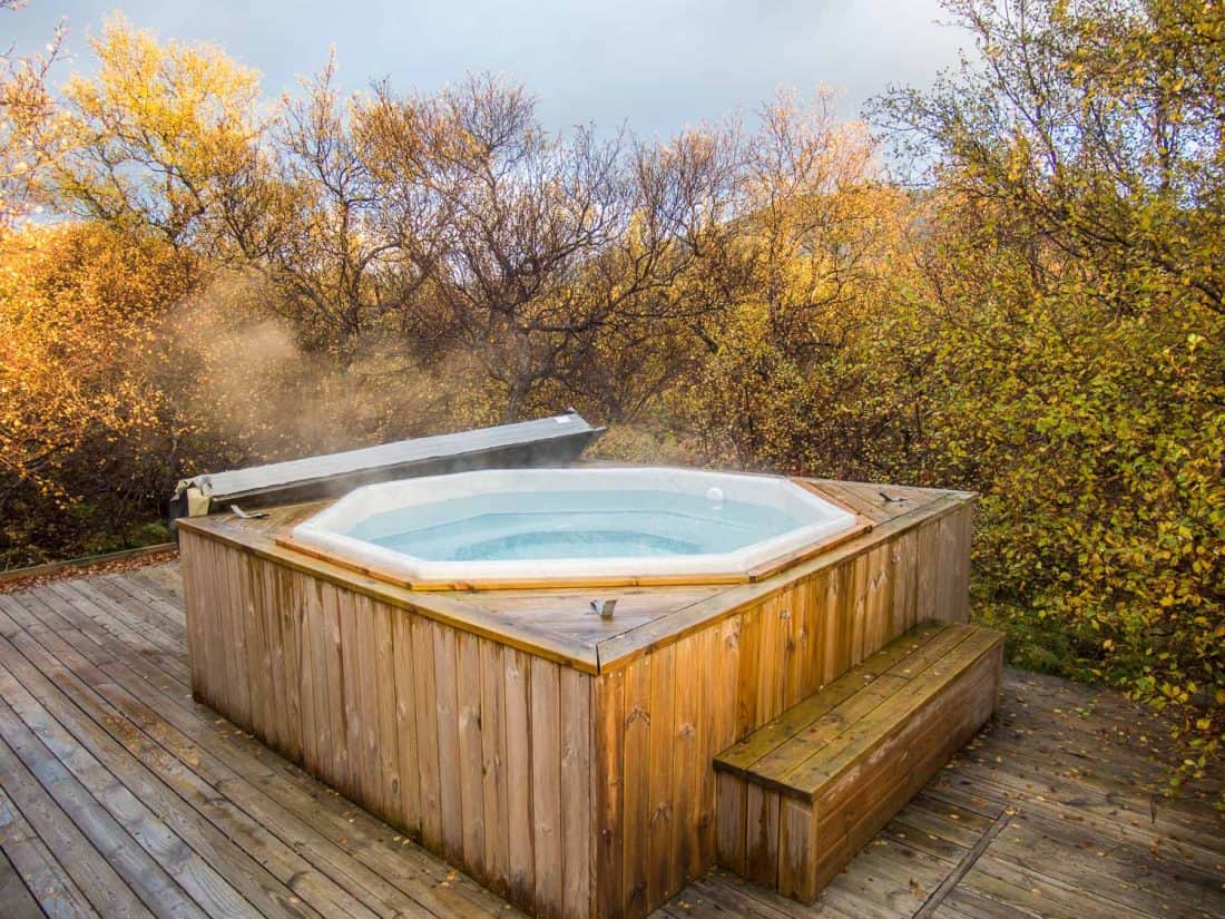 The hot tub at our Airbnb cabin in Husafell, Iceland