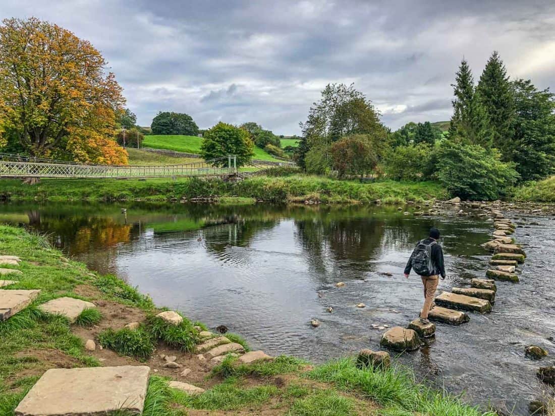 Hebden suspension bridge and stepping stones on the Dales Way Day 2, Yorkshire Dales, England
