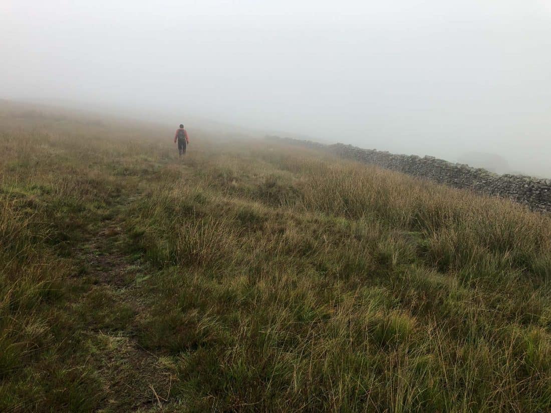 The misty moors past Shepherd's Cottage on the Dales Way, Yorkshire Dales, England