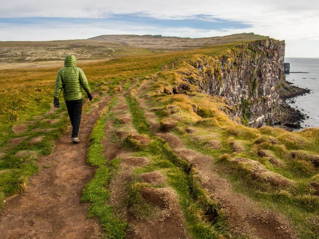 Walking along the Latrabjarg cliffs in the Westfjords, Iceland