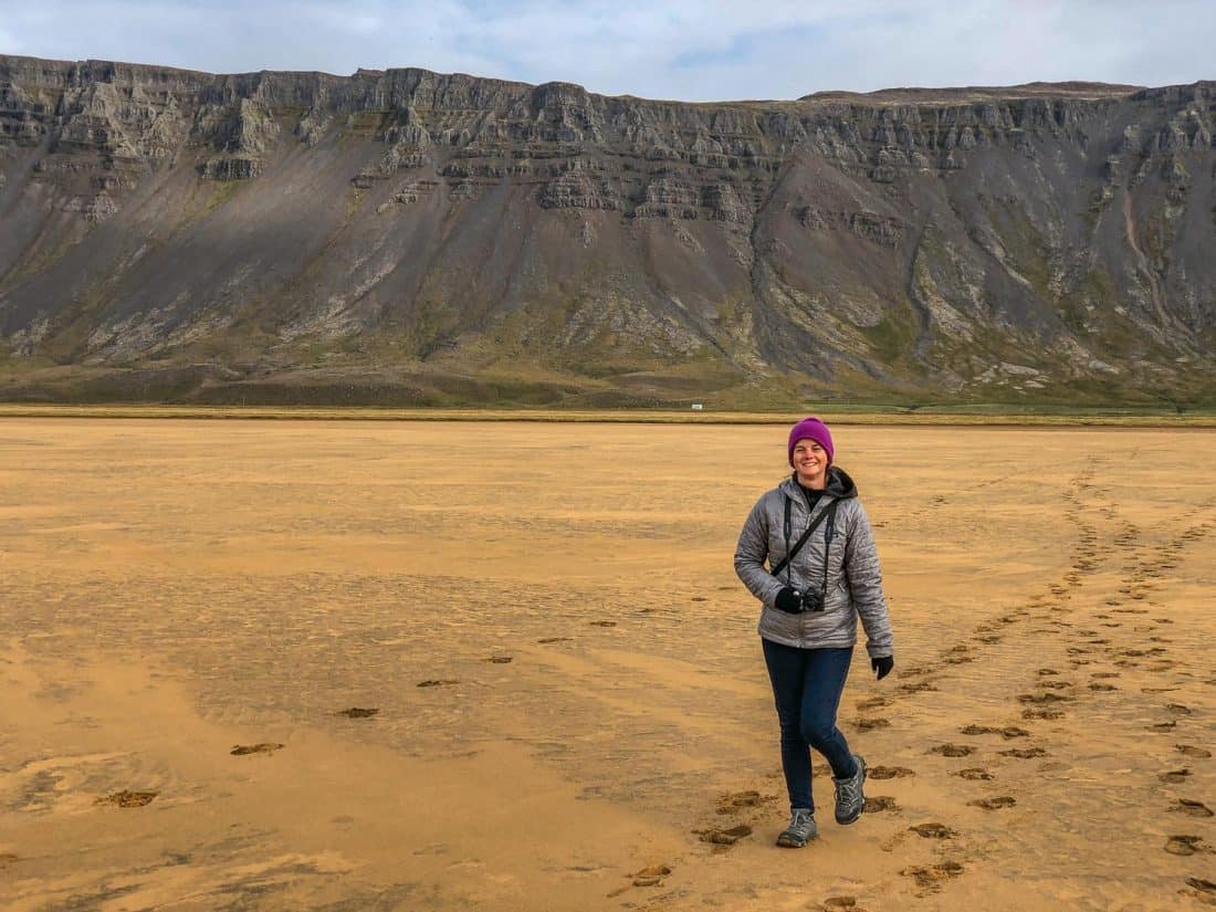 What to wear in Iceland - Erin on the red sand beach