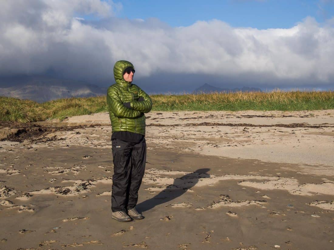 What to wear in Iceland - down jacket and waterproof trousers on Ytri Tunga beach