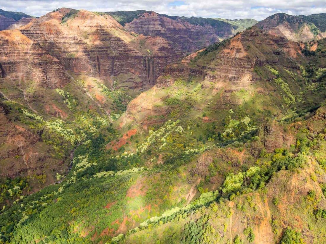 Waimea Canyon on a doors off helicopter Kauai tour with Jack Harter in Hawaii