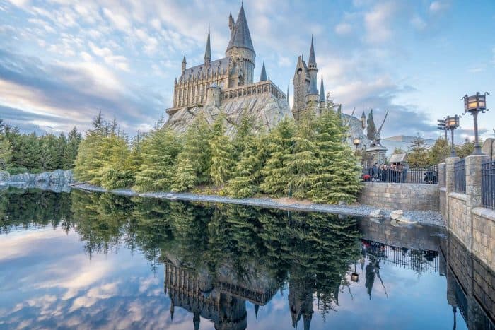 Hogwarts Castle reflected in the lake at The Wizarding World of Harry Potter at Universal Studios Japan in Osaka
