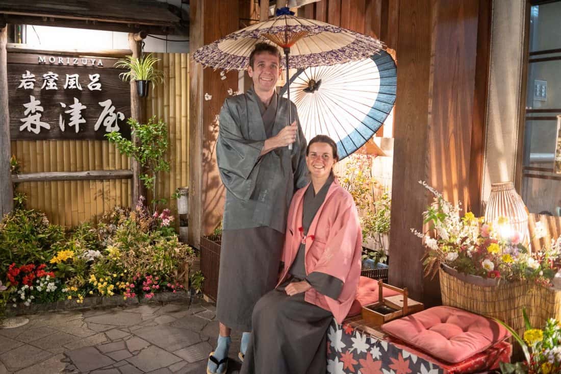 Erin and Simon in winter kimono outside Morizuya Ryokan in Kinosaki Onsen, Japan