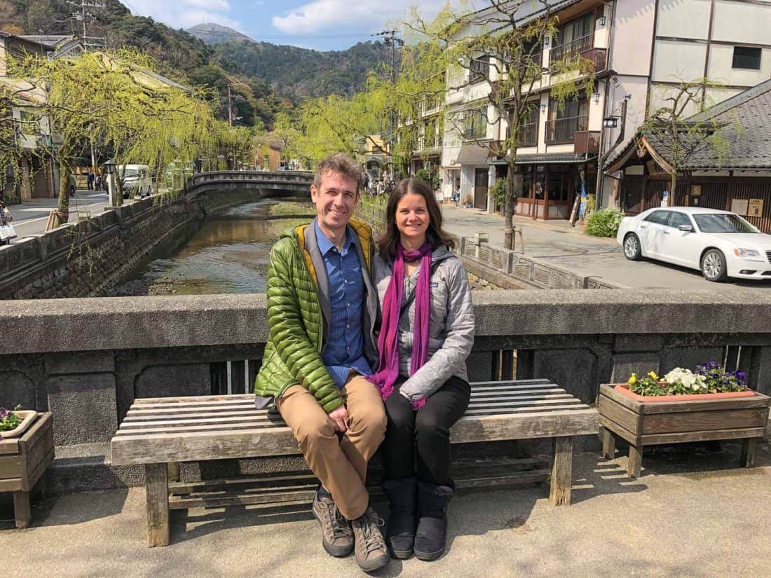 Erin and Simon by the willow lined canal in Kinosaki Onsen