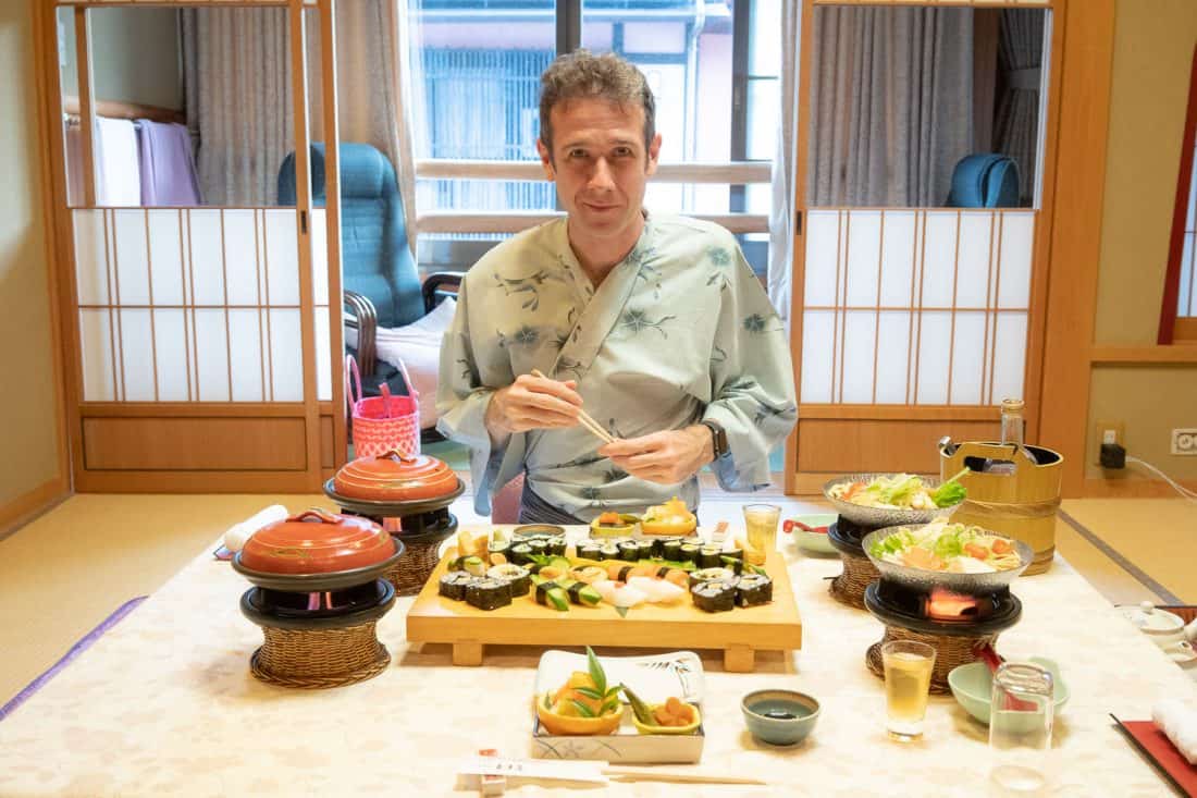 Simon eating vegetarian sushi at Morizuya Ryokan in Kinosaki Onsen