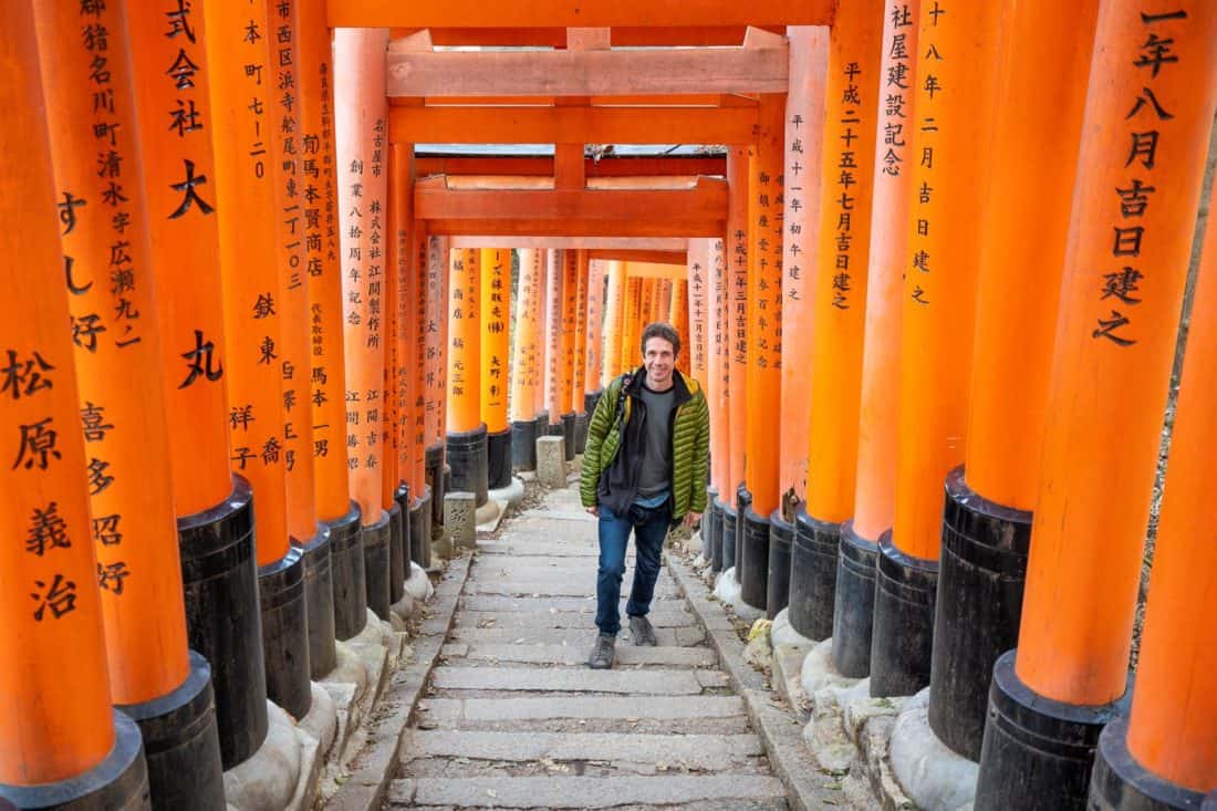 Hiking up 12,000 steps at Fushimi Inari shrine in Kyoto in the Bluffworks travel jeans