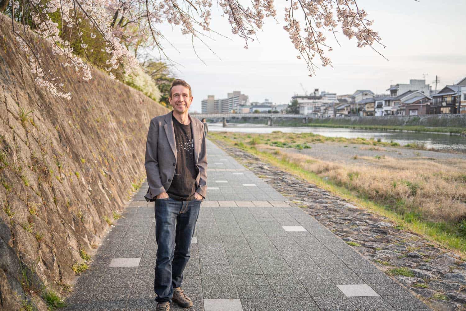 Simon wearing Bluffworks Departure jeans by the River Kamo in Kyoto