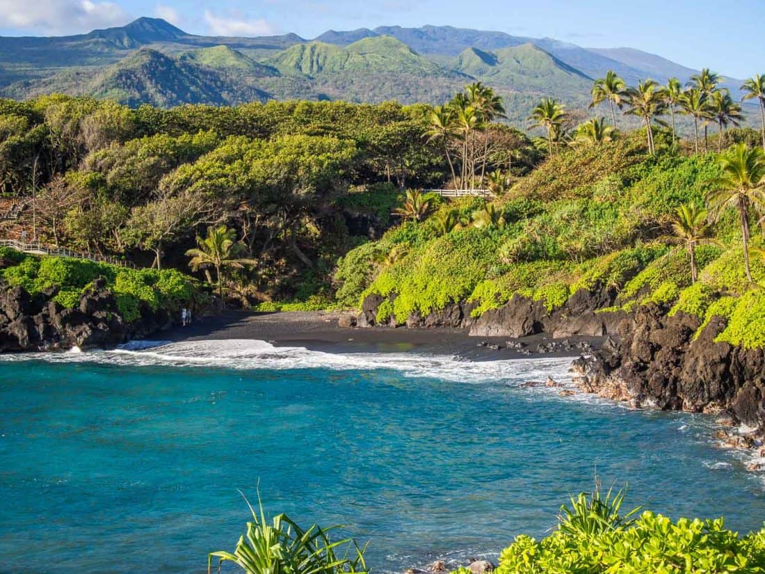 View of the black sand beach at Waianapanapa State Park near Hana from the coastal path above, Maui, Hawaii, USA