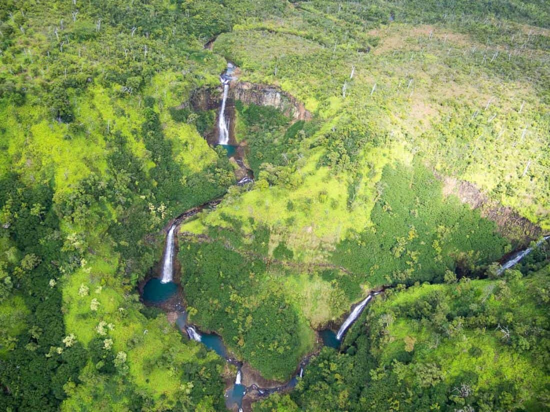 Waterfalls in Kauai from a helicopter