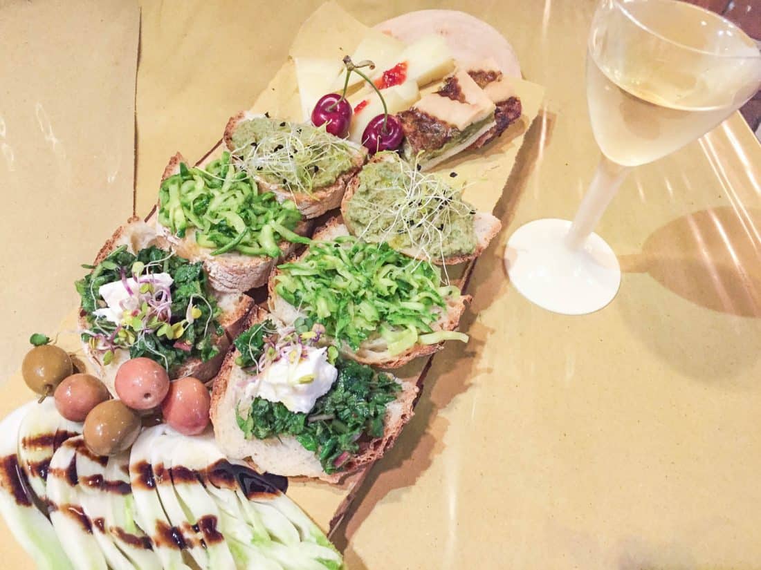 Bruschetta and cheese plate at Tastevere Kmzero wine bar and farm shop in Trastevere, Rome