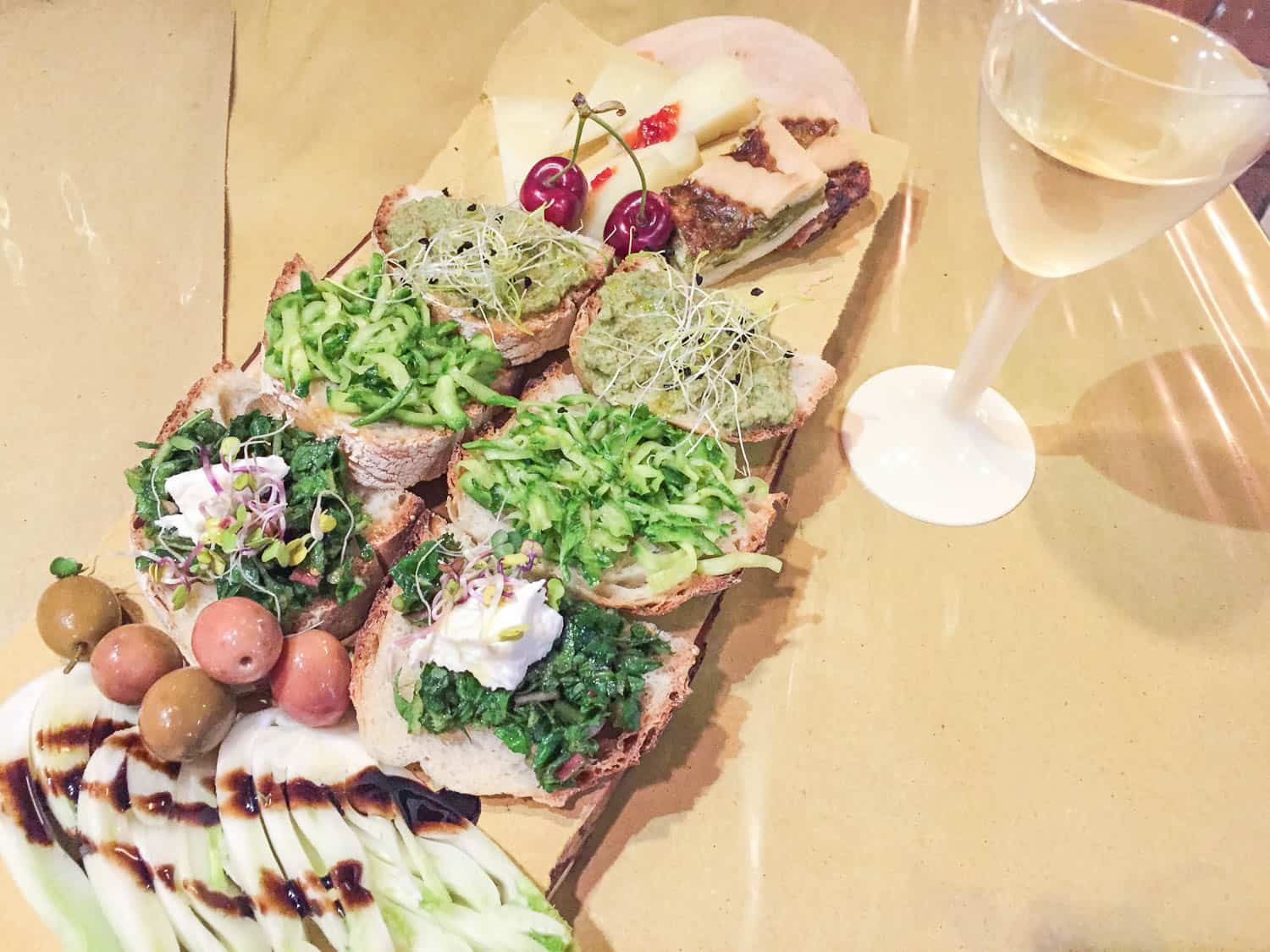 Bruschetta and cheese plate at Tastevere Kmzero wine bar and farm shop in Trastevere, Rome