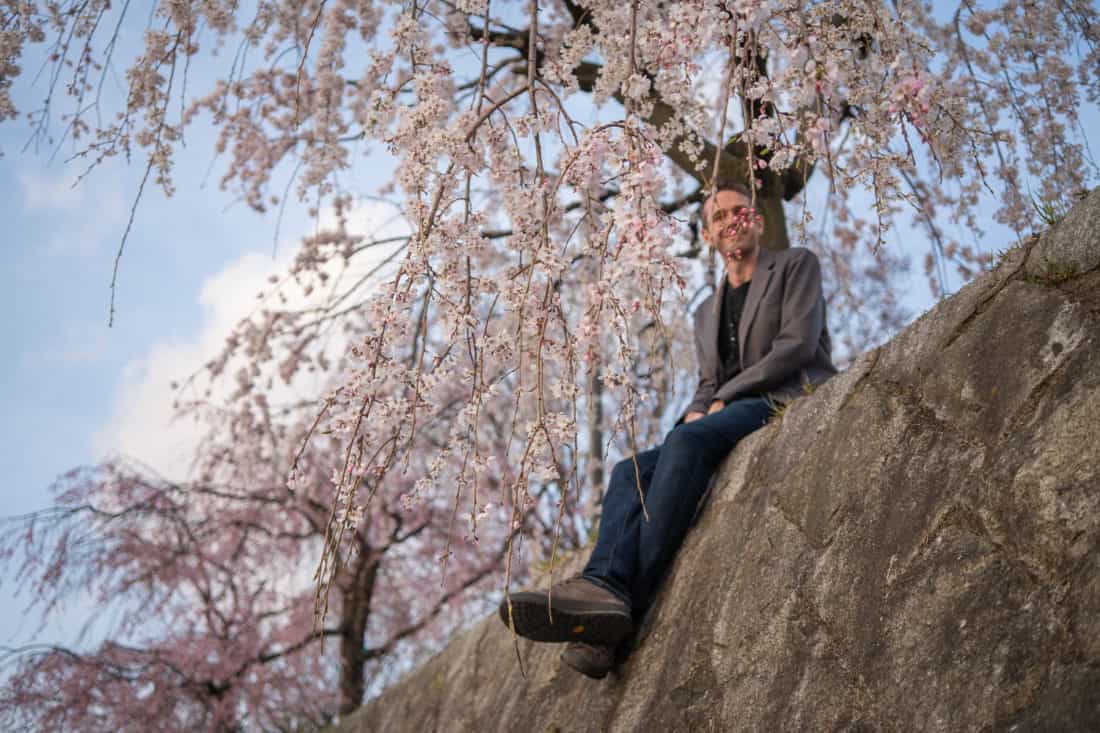 Simon amongst the Kyoto cherry blossoms along the Kamo River