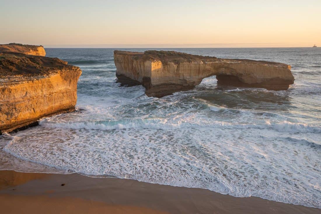 Sunset at London Bridge rock formation on the Great Ocean Road, Victoria, Australia