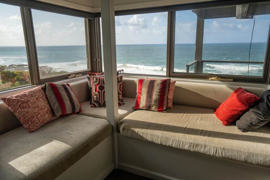 The window seat overlooking the ocean at Points South by the Sea cottages on the Great Ocean Road, Victoria, Australia