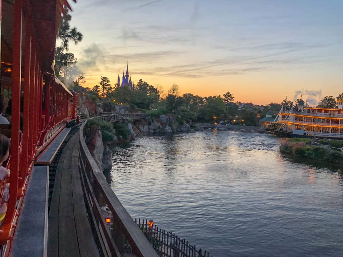 The view from Western River Railroad at Tokyo Disneyland at sunset of the Mark Twain Riverboat