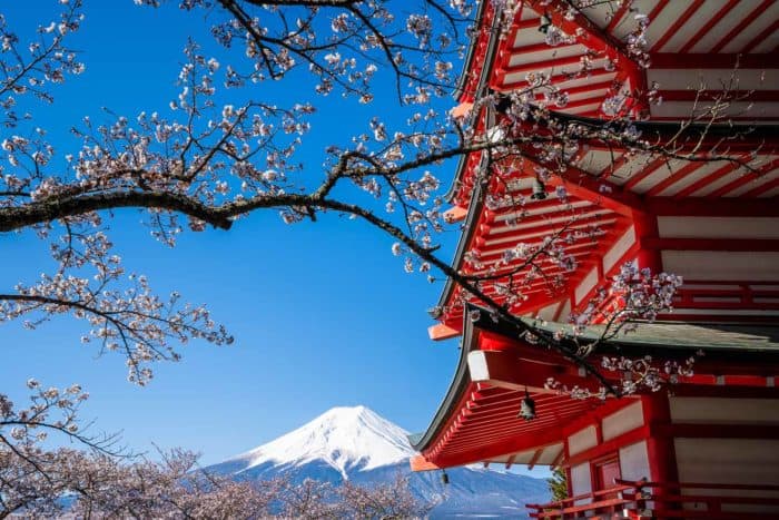 Mount Fuji and cherry blossoms at Chureito Pagoda at Arakurayama Sengen Park near Kawaguchiko, Japan