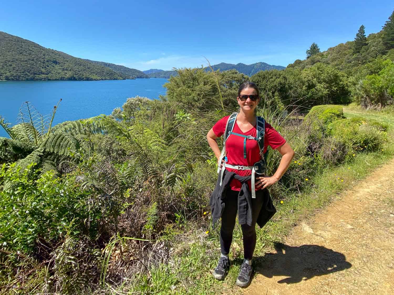 Erin hiking on Day 2 of the Queen Charlotte Track, New Zealand