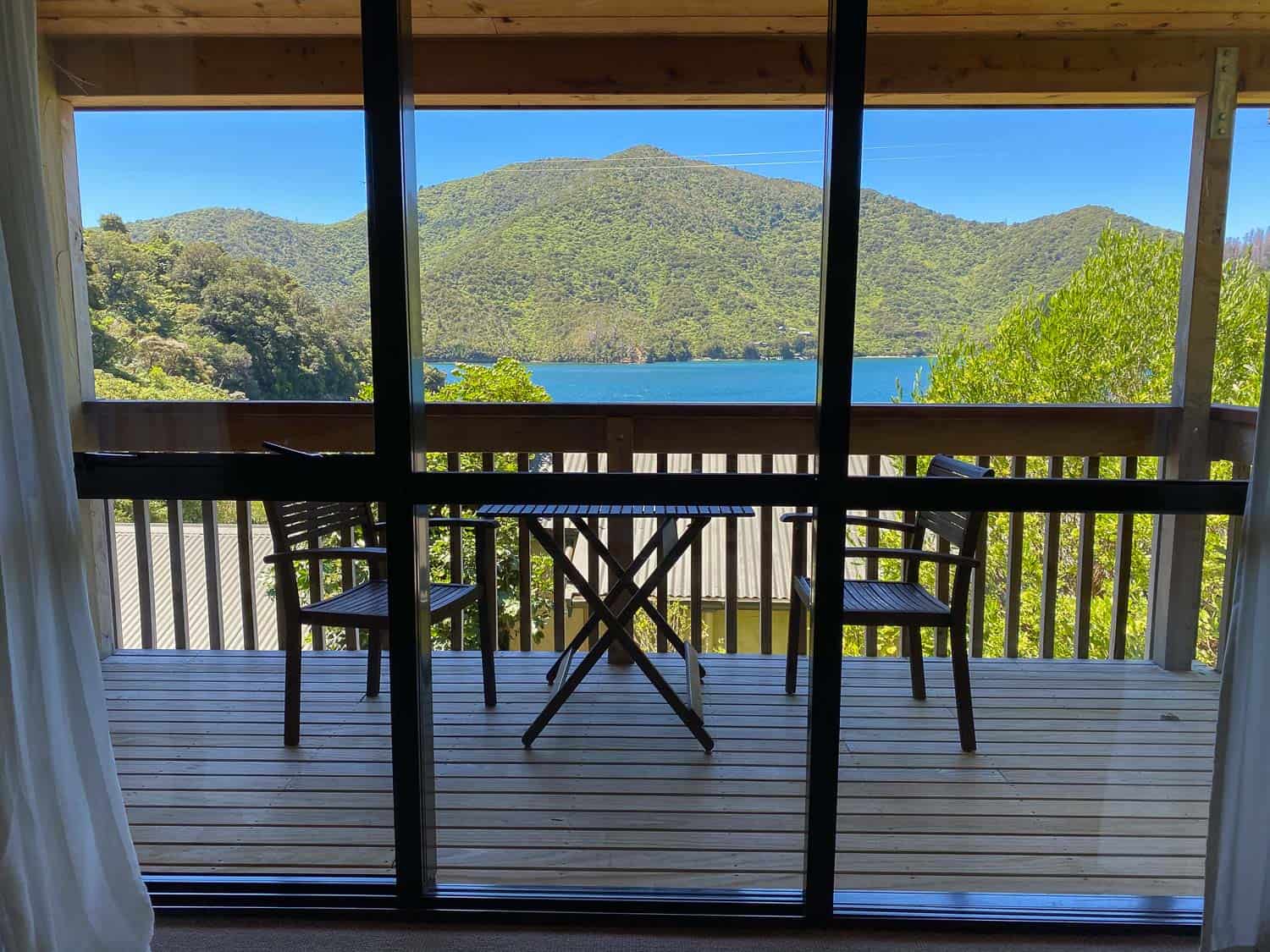 The sea view from the balcony of the Kakariki Chalet at Lochmara Lodge in the Marlbrough Sounds, Queen Charlotte Track, New Zealand