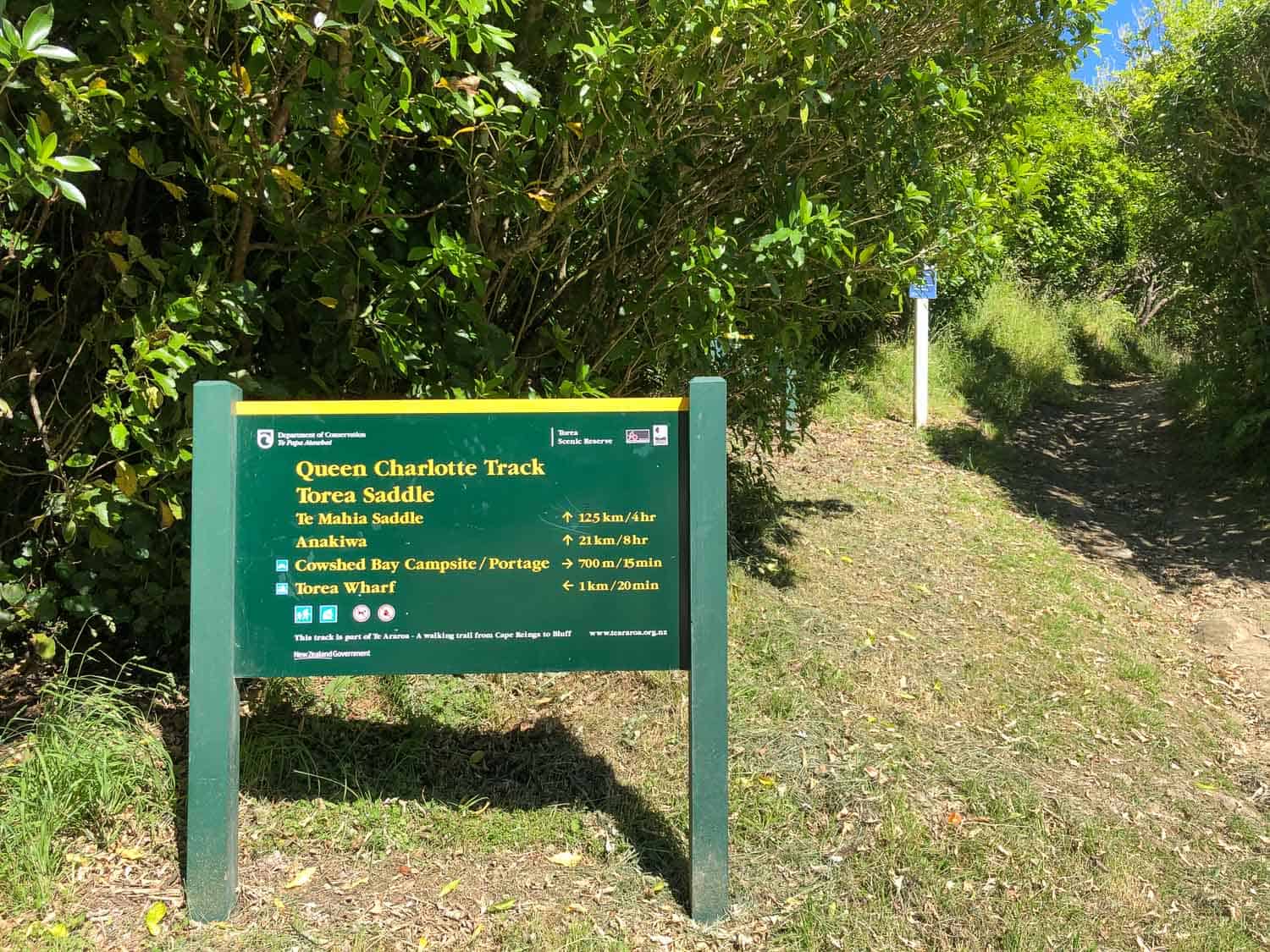 The Torea Saddle DOC sign at the start of Day 4 on the Queen Charlotte Track, New Zealand