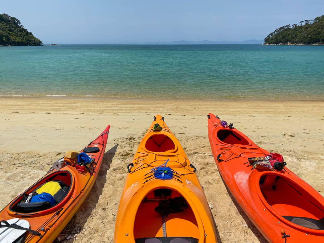 Kayaks at Bark Bay in Abel Tasman National Park, New Zealand