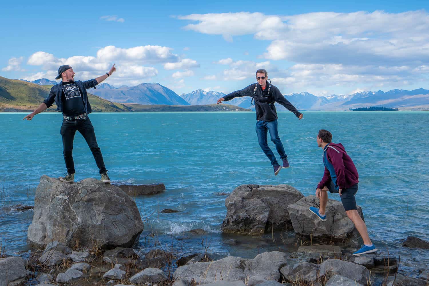 Simon jumping at Lake Tekapo New Zealand