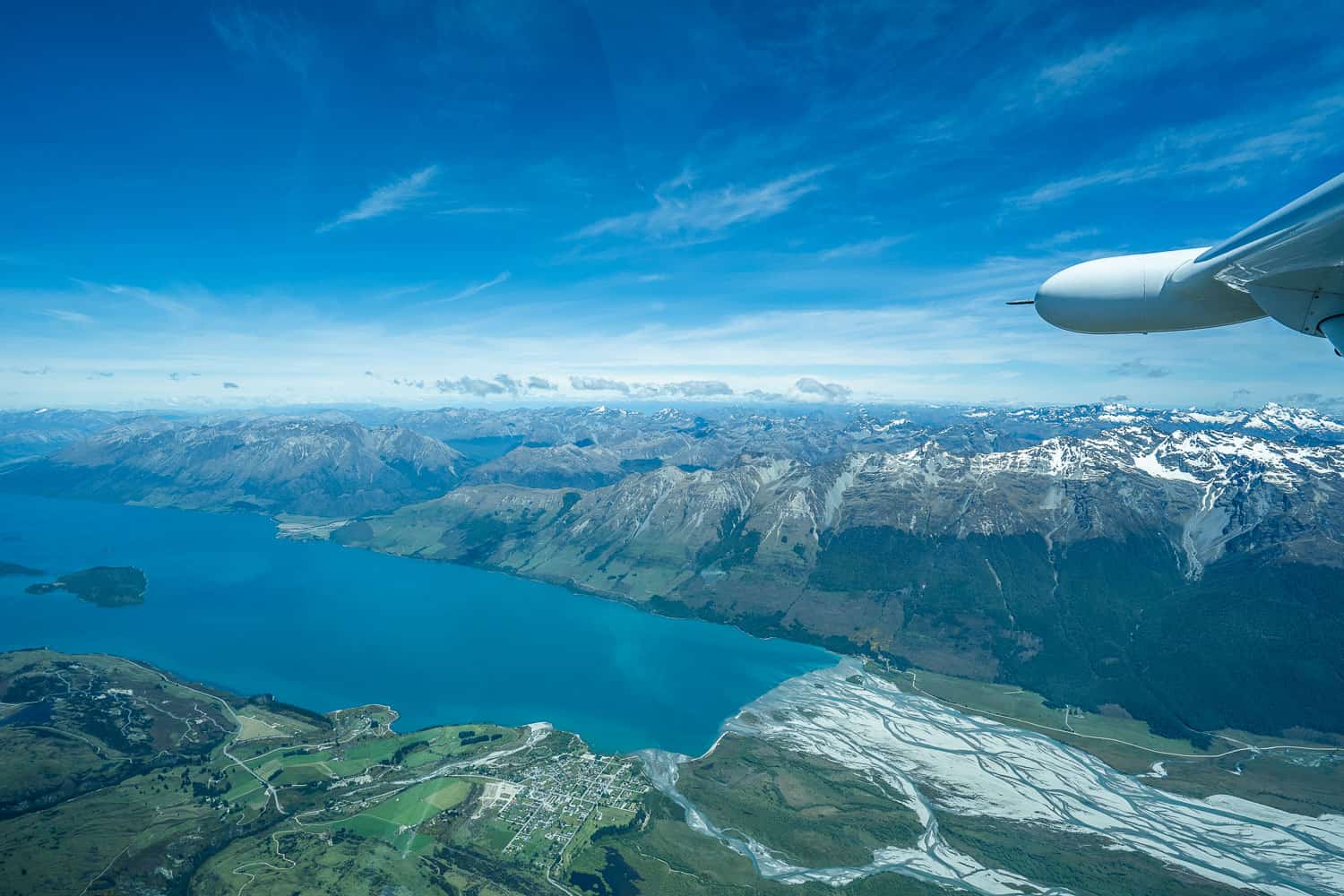 How to buy travel insurance when already abroad - flying over Queenstown, New Zealand