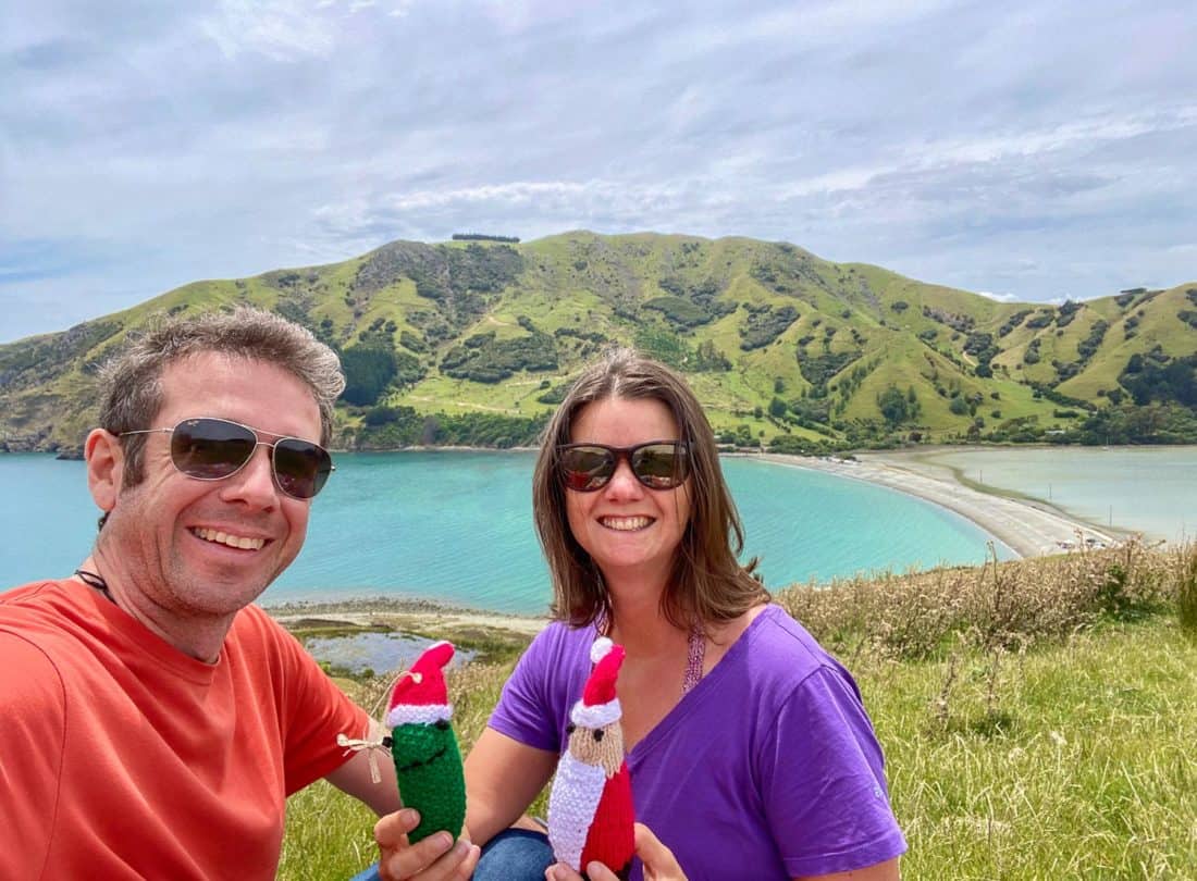 Simon and Erin with Christmas decorations on the hill above Cable Bay, New Zealand