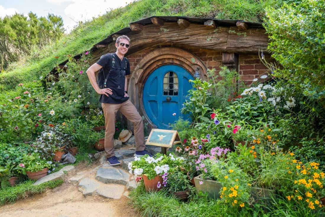 Simon at a Hobbit hole at Hobbiton movie set, New Zealand