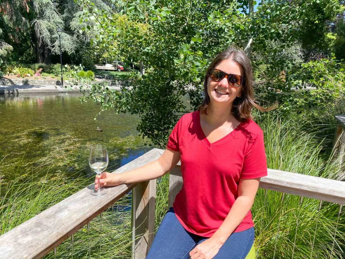 Drinking wine in the gardens at Suter Cafe, Nelson, New Zealand