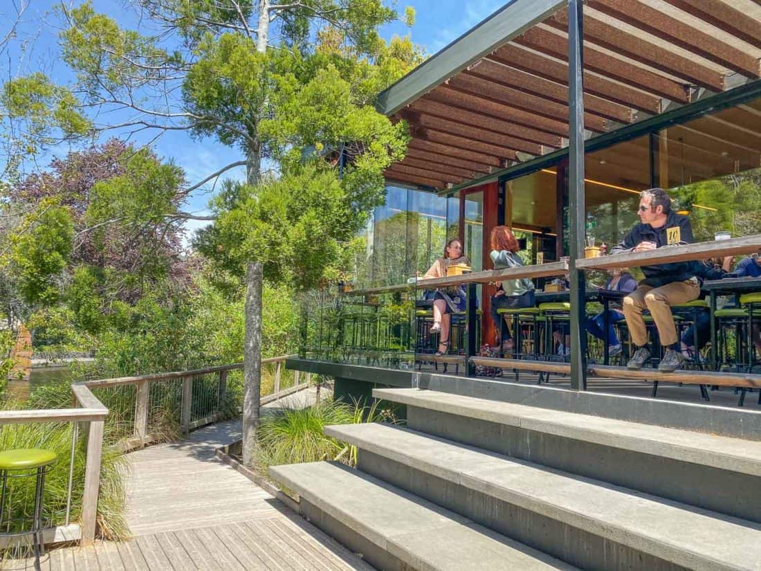 Outside seating overlooking Queens Gardens at the Suter Cafe in Nelson, New Zealand 