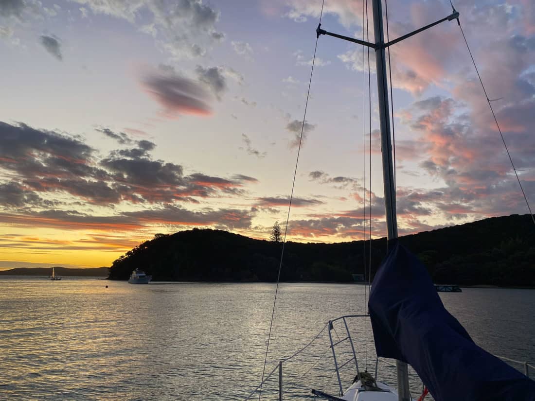 Sunset while sailing the Bay of Islands at Otehei Bay on Urupukapuka Island