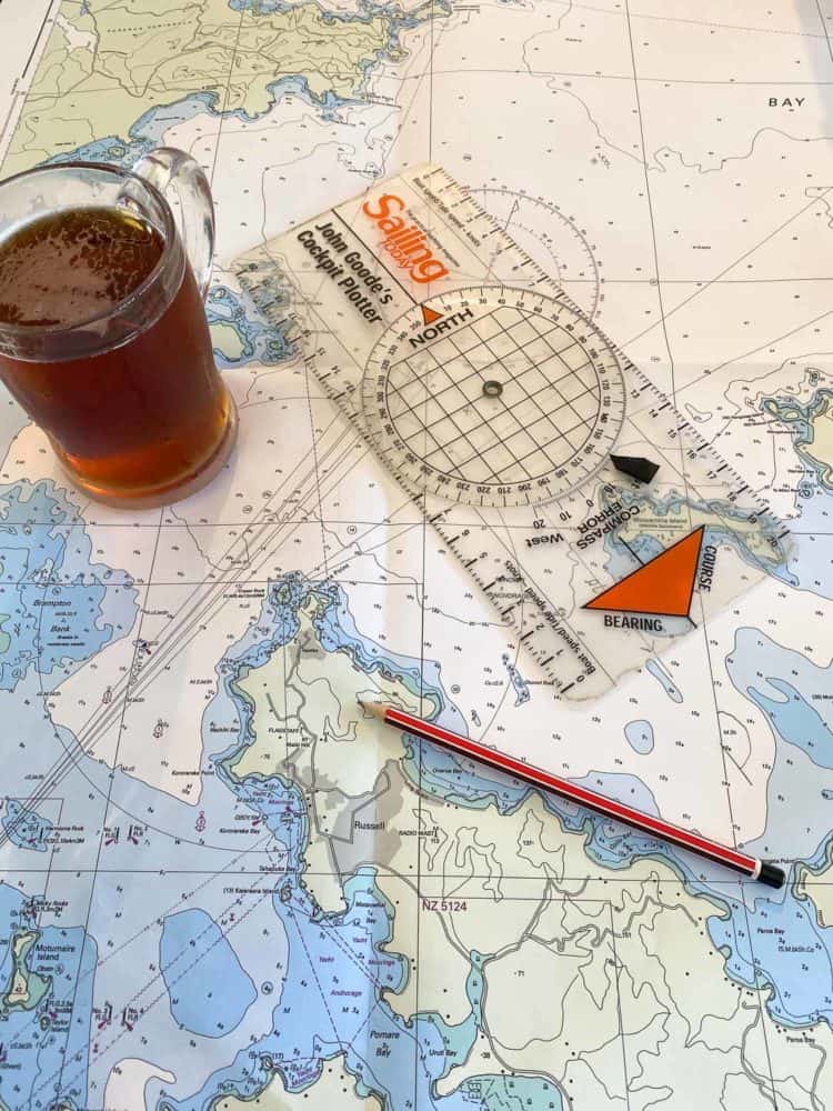 Chart planning with a beer at Opua Cruising Club