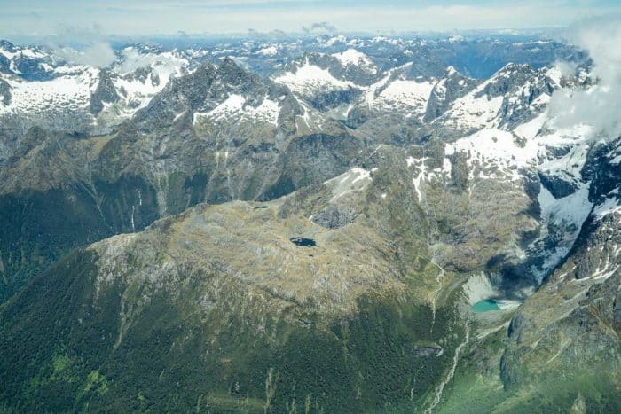 Snowy mountain views on a scenic flight from Queenstown to Milford Sound in New Zealand