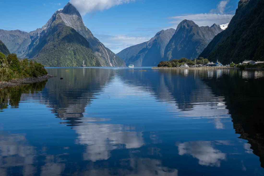 Mitre Peak reflected in the water at Milford Sound, New Zealand