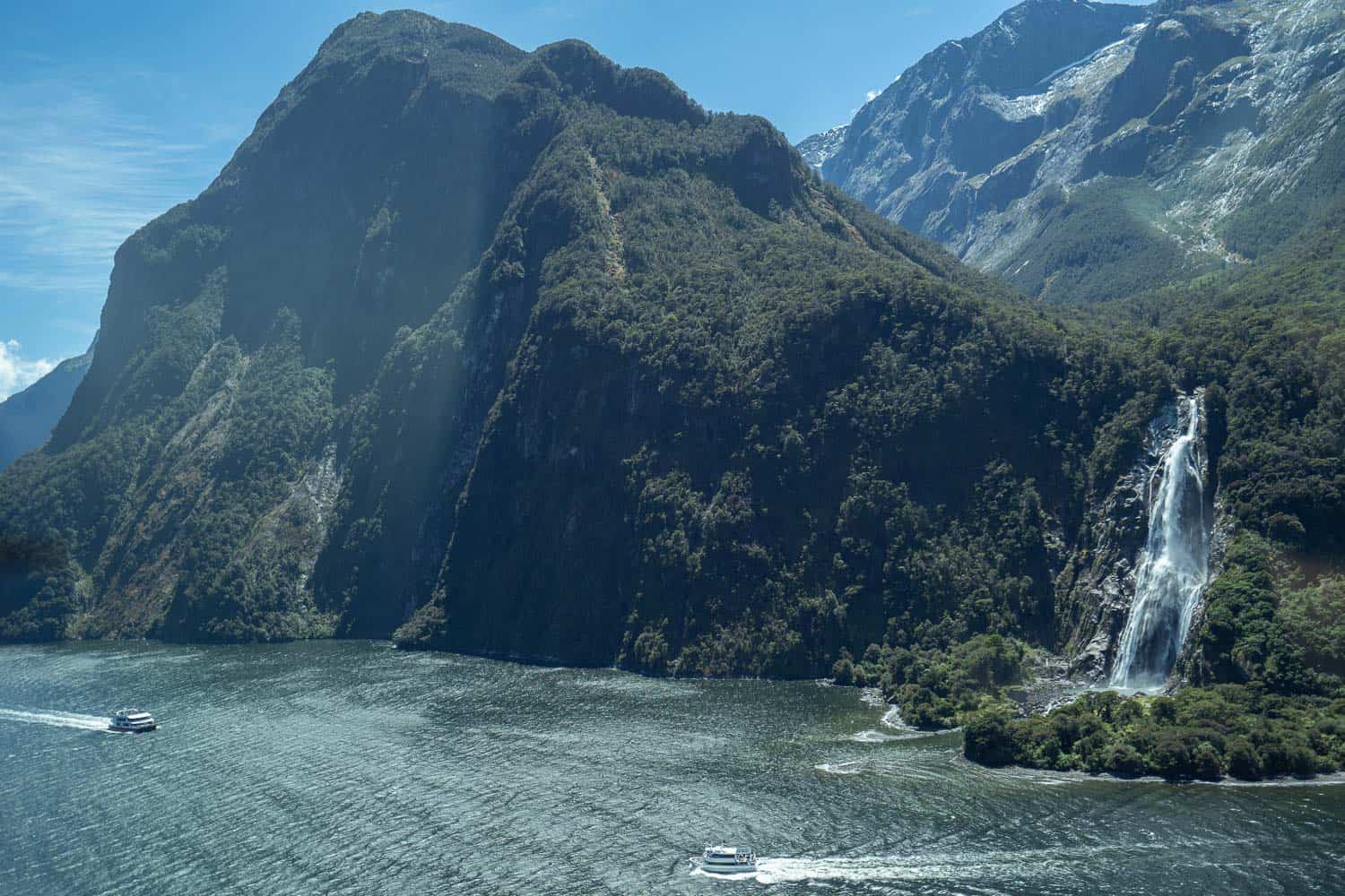 Flying over Bowen Falls in Milford Sound