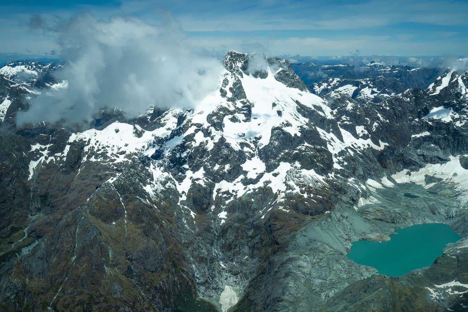 Glacial lake in the mountains on flight from Milford Sound to Queenstown 