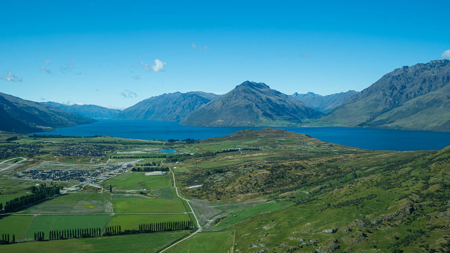 Flying over Lake Wakatipu near Queenstown in the summer on the way to Milford Sound