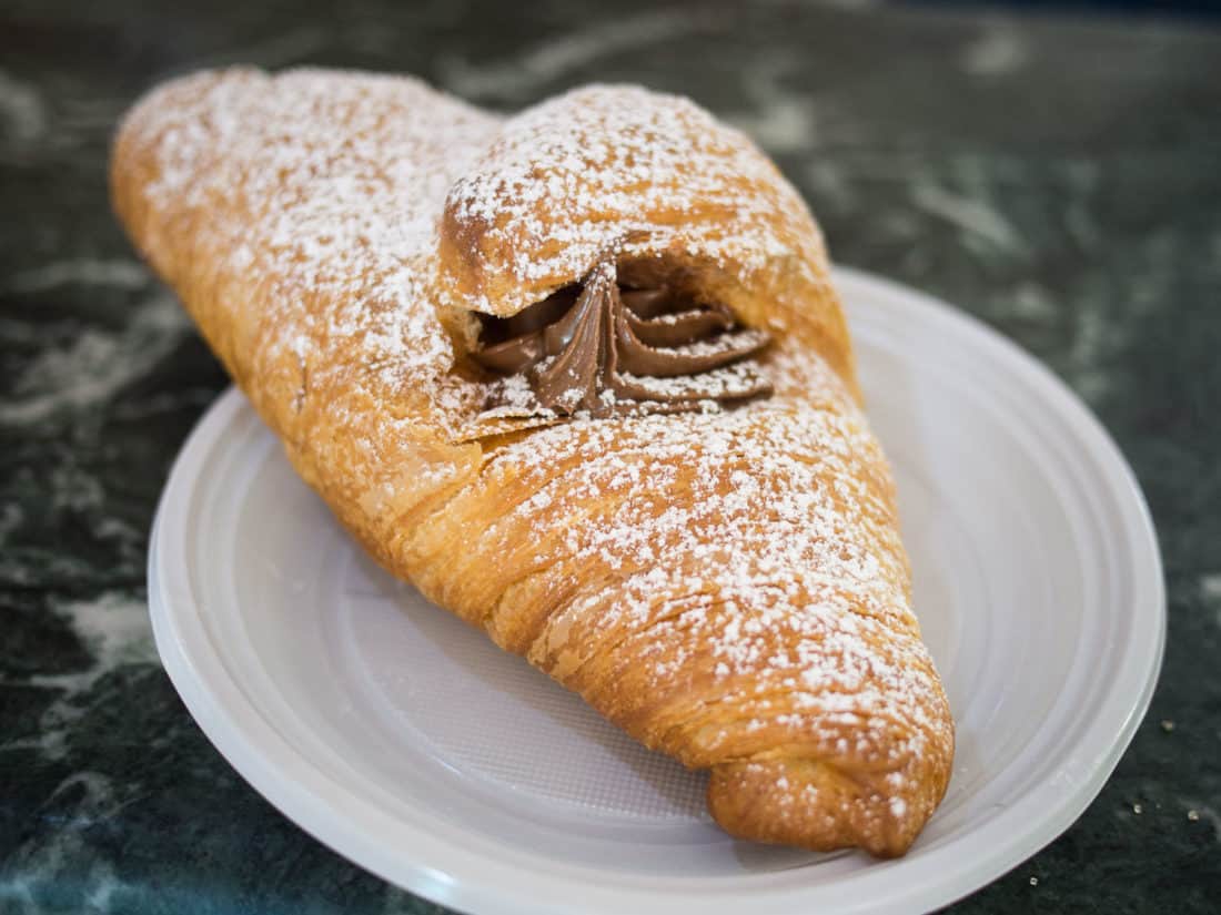A typical Italian breakfast - a cornetto filled with nutella