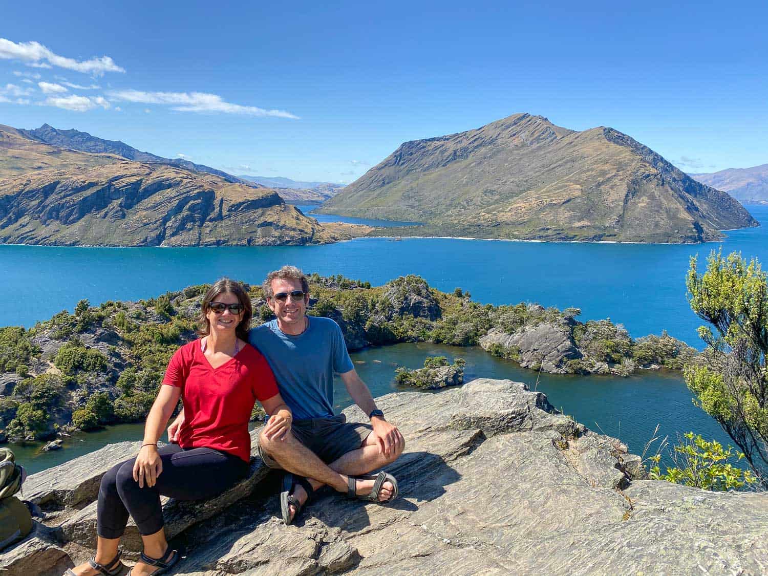 Erin and Simon at the viewpoint on Mou Waho Island, one of the best things to do in Wanaka, New Zealand