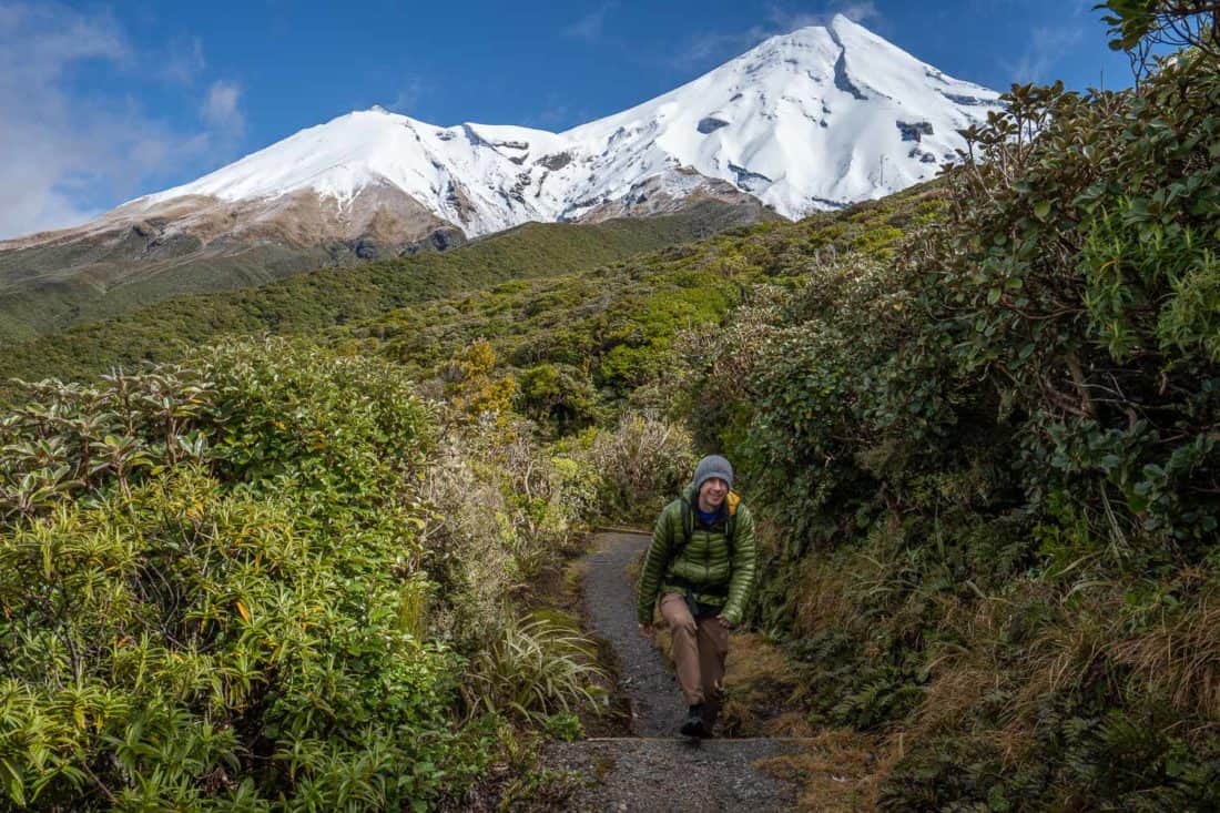 Hiking near Stratford Plateau in Egmont National Park with views of Mt Taranaki, New Zealand