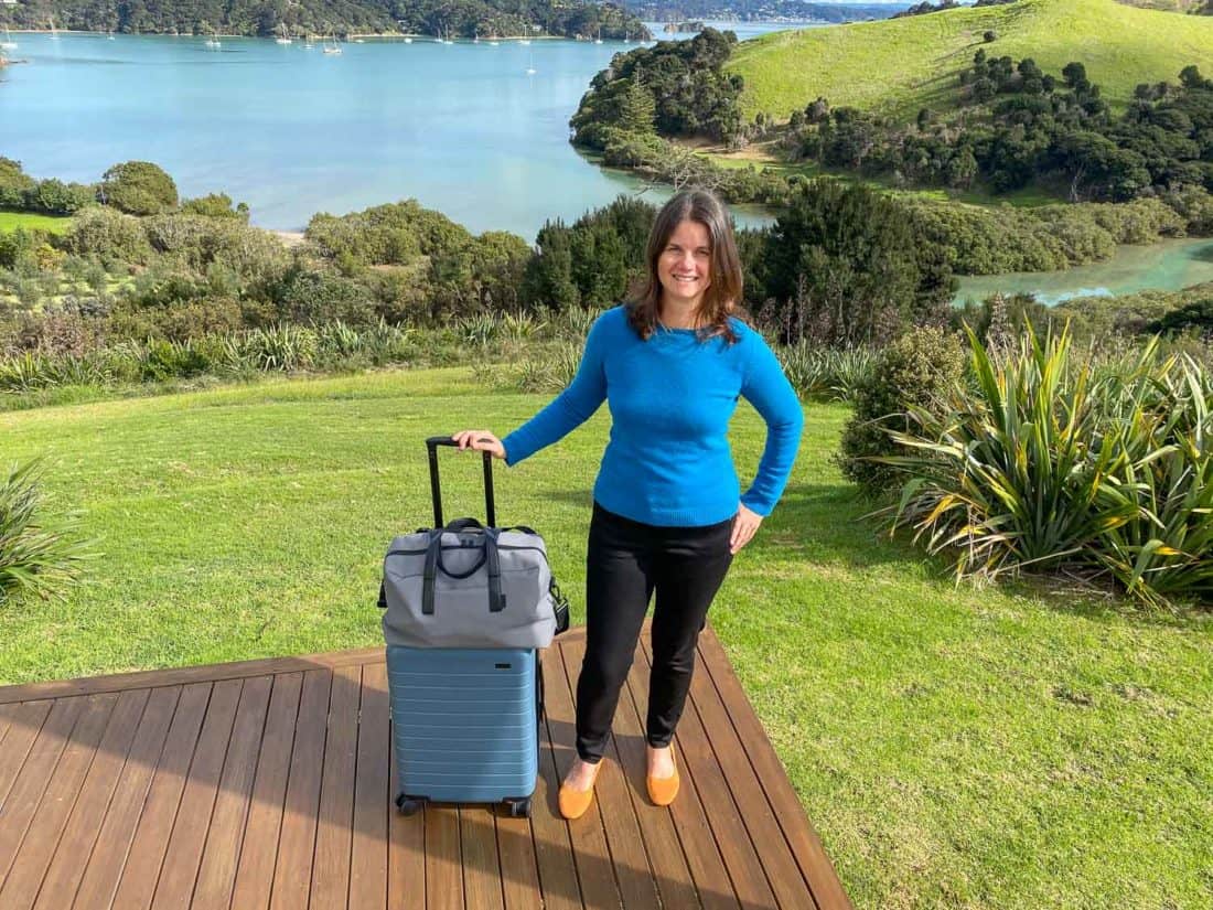 Wearing my Allbirds Tree Breezers flats with my Away luggage in Bay of Islands