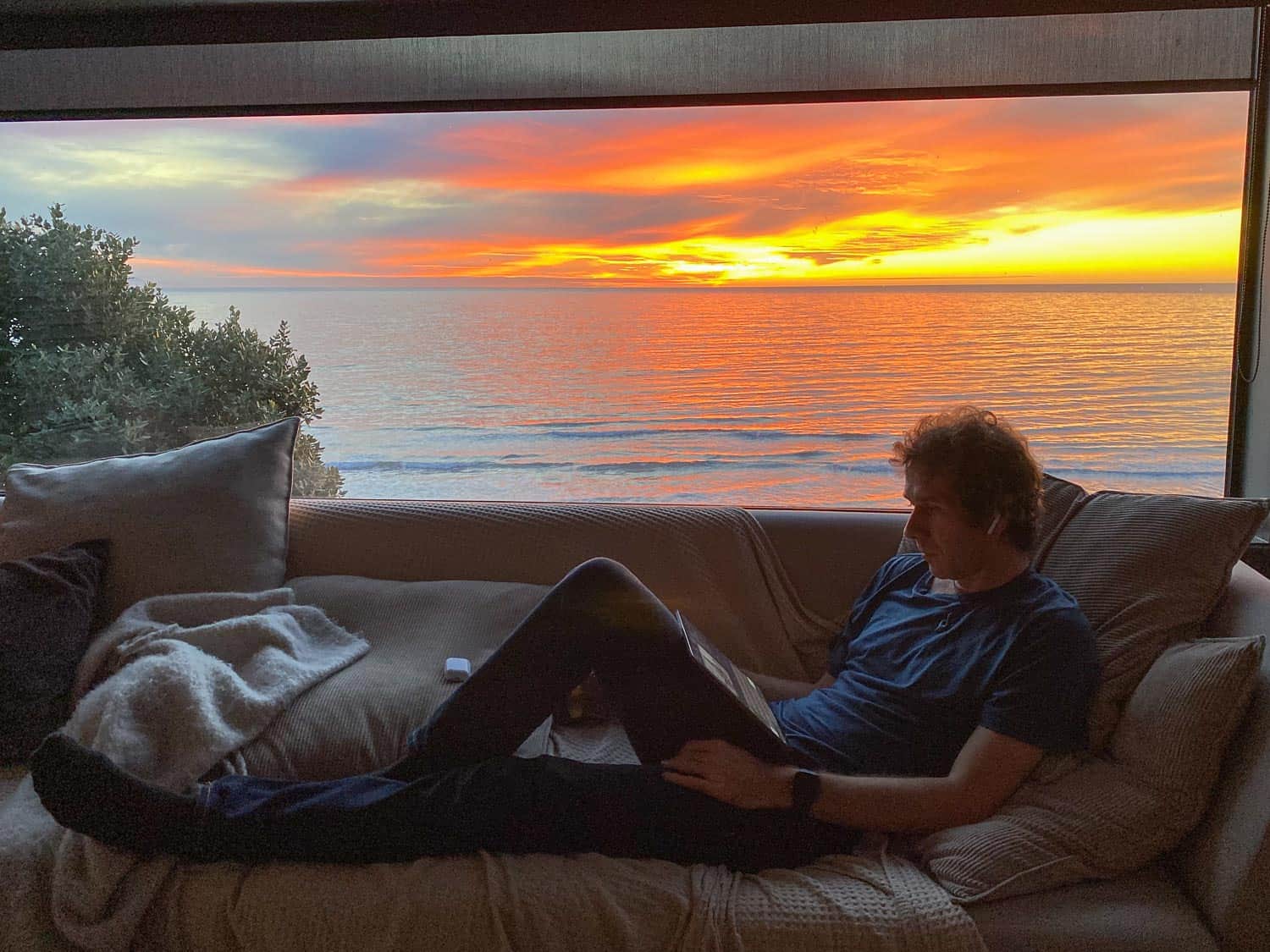 Simon at sunset in our beach house in Paekakariki