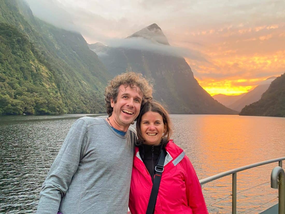 Simon and Erin at sunset on an overnight cruise in Doubtful Sound, New Zealand