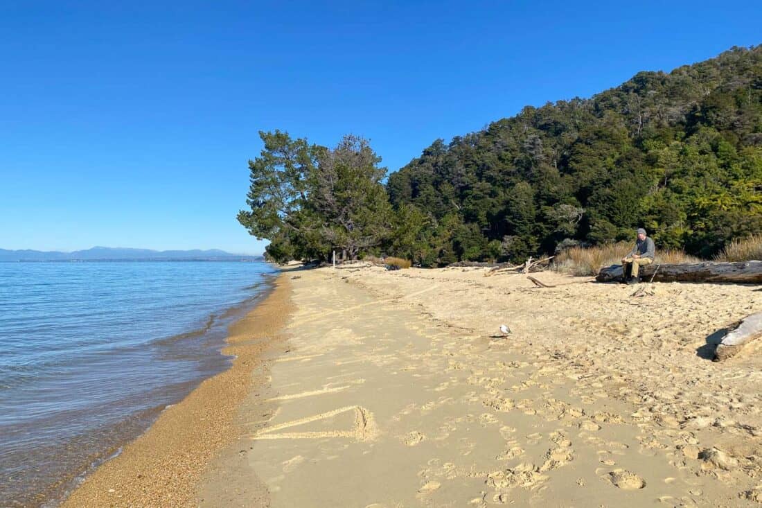 Apple Tree Bay beach on the Marahau to Anchorage section of the Abel Tasman Track, New Zealand