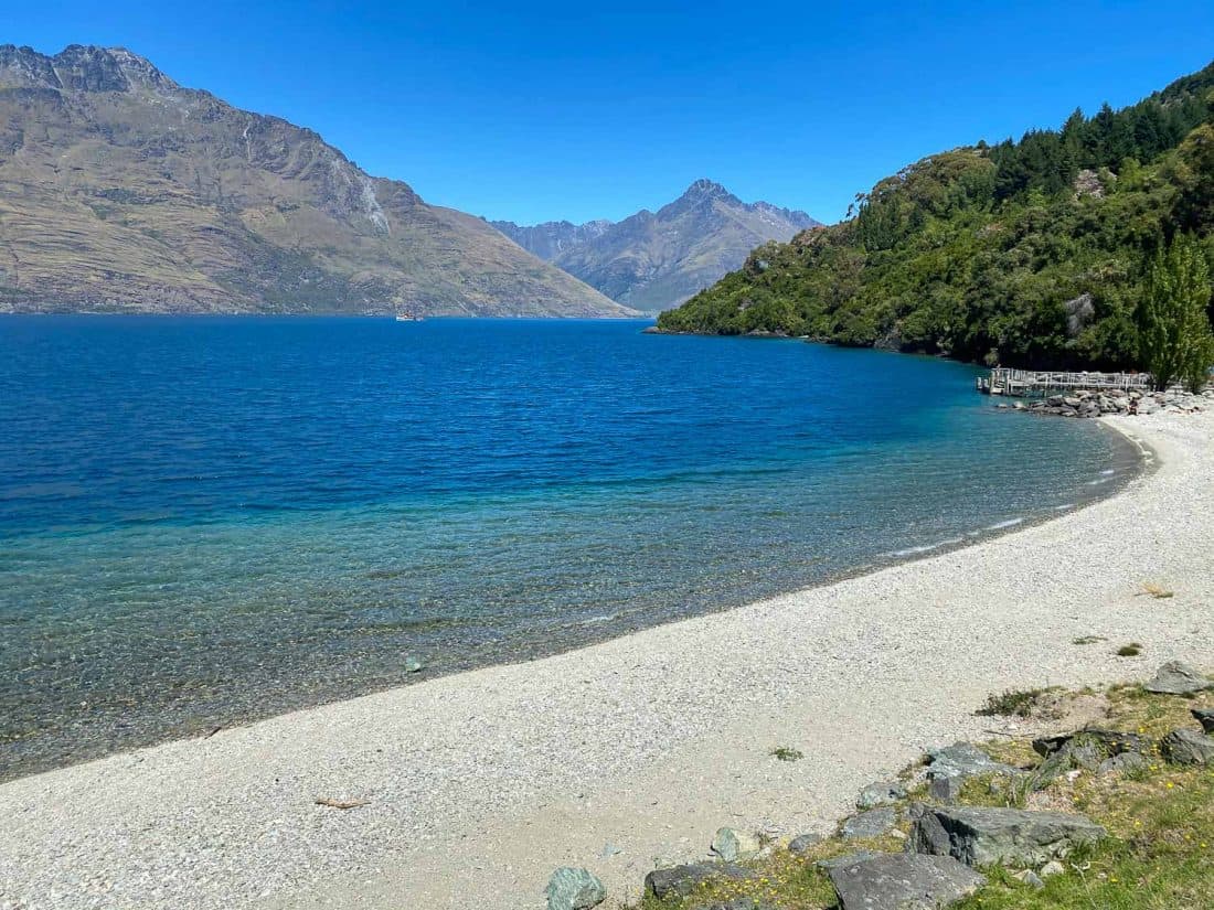 Sunshine Bay beach in Queenstown in summer