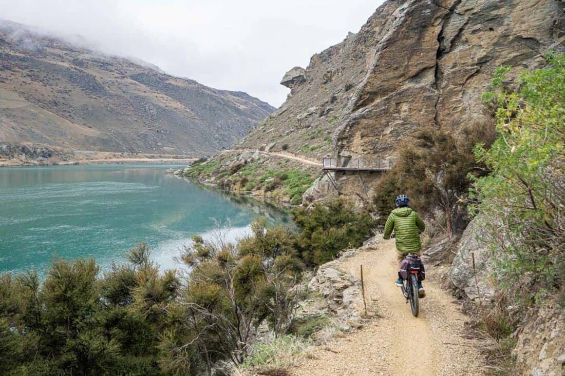 Cycling towards a bolt on bridge on the Lake Dunstan Cycle Trail through Cromwell Gorge