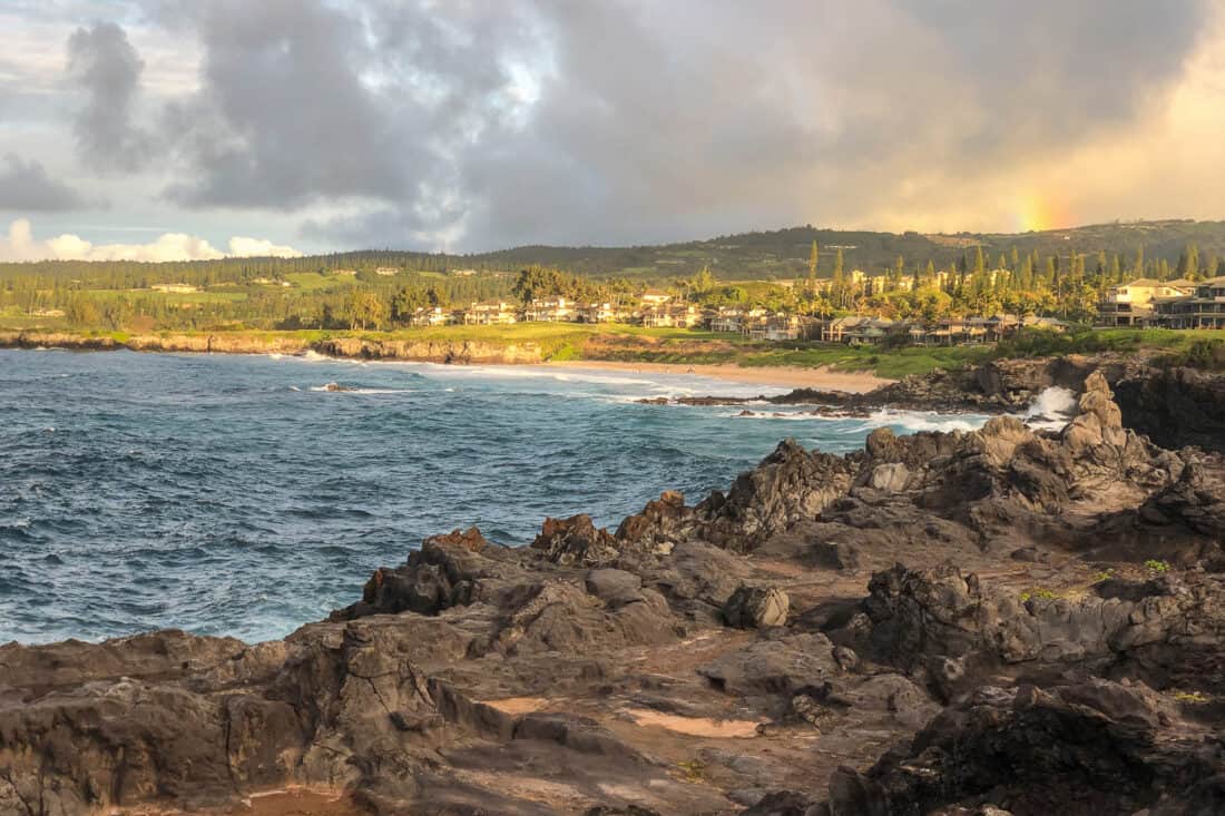 Rainbow starting to form over the Kapalua Coastal Trail, Maui, Hawaii, USA