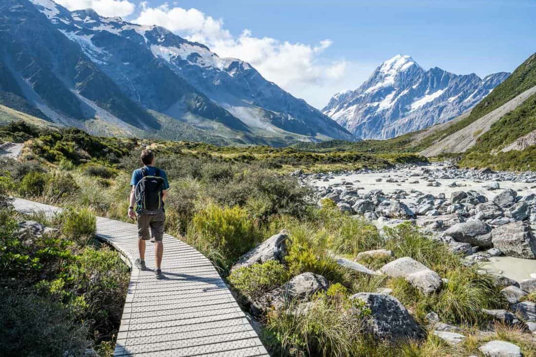 Hiking the Hooker Valley Track at Mt Cook in summer in the South Island NZ